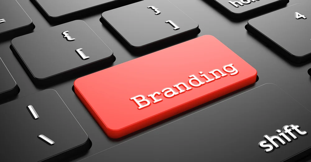 Branding Wisdom from speMEDIA | Print to impress picture of a Keyboard written Branding in red